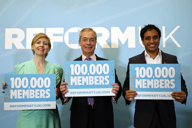 <p>Former Conservative minister Andrea Jenkyns, who has joined Reform UK, party chairman Zia Yusuf and party leader Nigel Farage mark Reform’s six-figure membership at a press conference in central London on 28 November 2024</p>