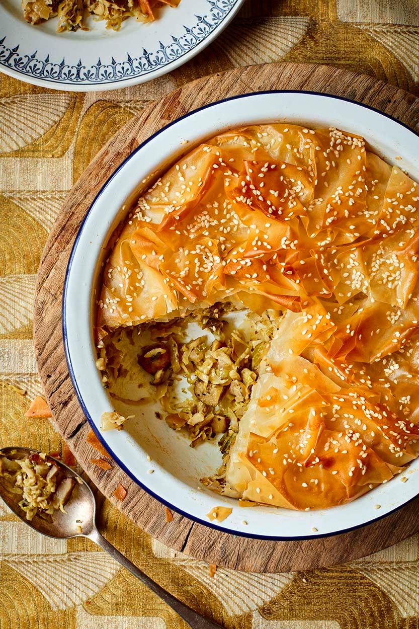 A crackling filo pie filled with earthy chestnuts, shredded sprouts and herby parsnip for a plant-based festive centerpiece