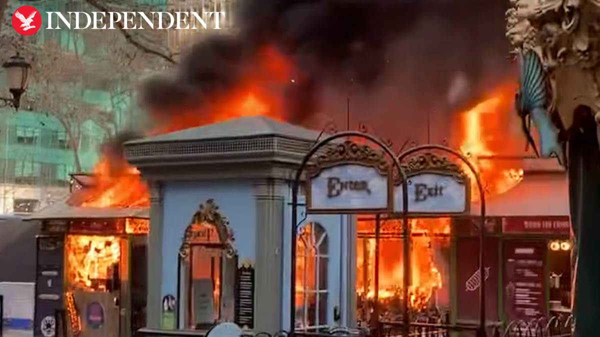 Watch: Fire engulfs stall at holiday market in New York City