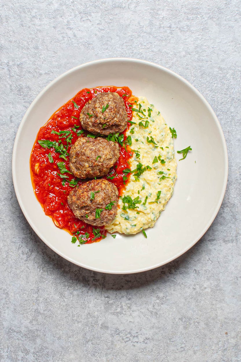 A festive twist on comfort food – these turkey meatballs pair perfectly with creamy polenta and a rich, tangy tomato sauce