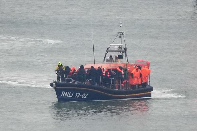 <p>The Dungeness lifeboat arrives in Dover having rescued more people from a small boat in the Channel on Saturday </p>