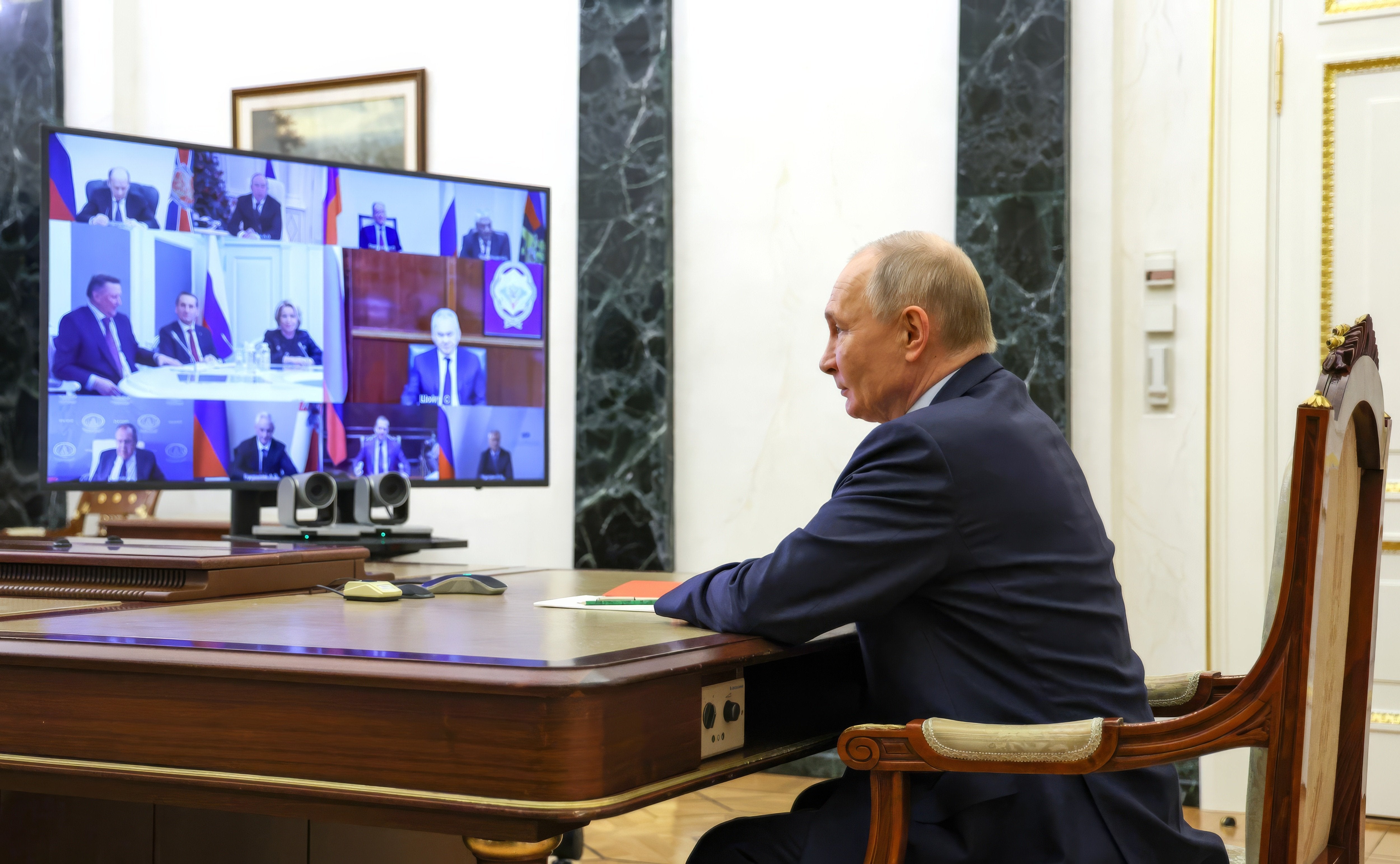 Russian president Vladimir Putin chairs a meeting of the permanent members of the Security Council from the Kremlin