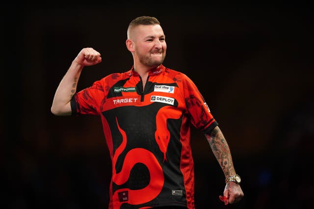 Nathan Aspinall reached the last 16 of the PDC World Darts Championship (Zac Goodwin/PA)