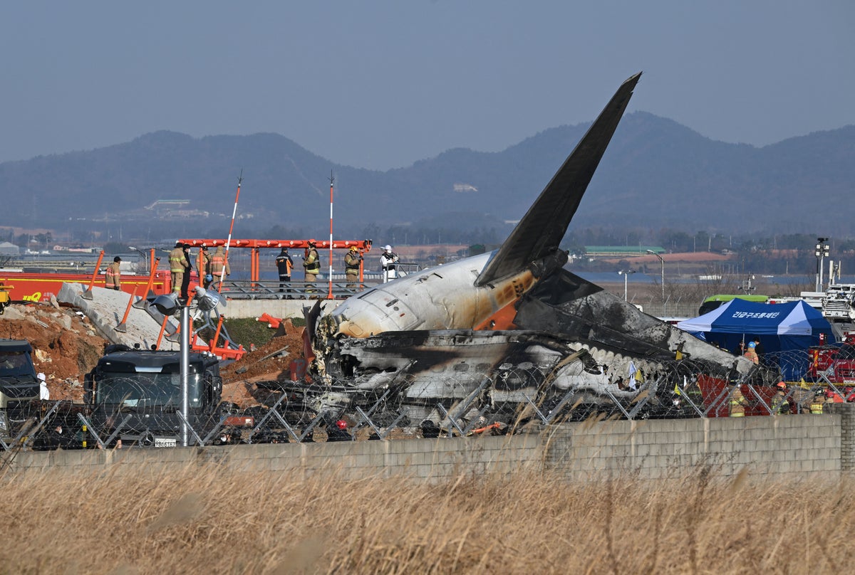 Emergency workers assess Jeju Air crash site at South Korea’s Muan airport