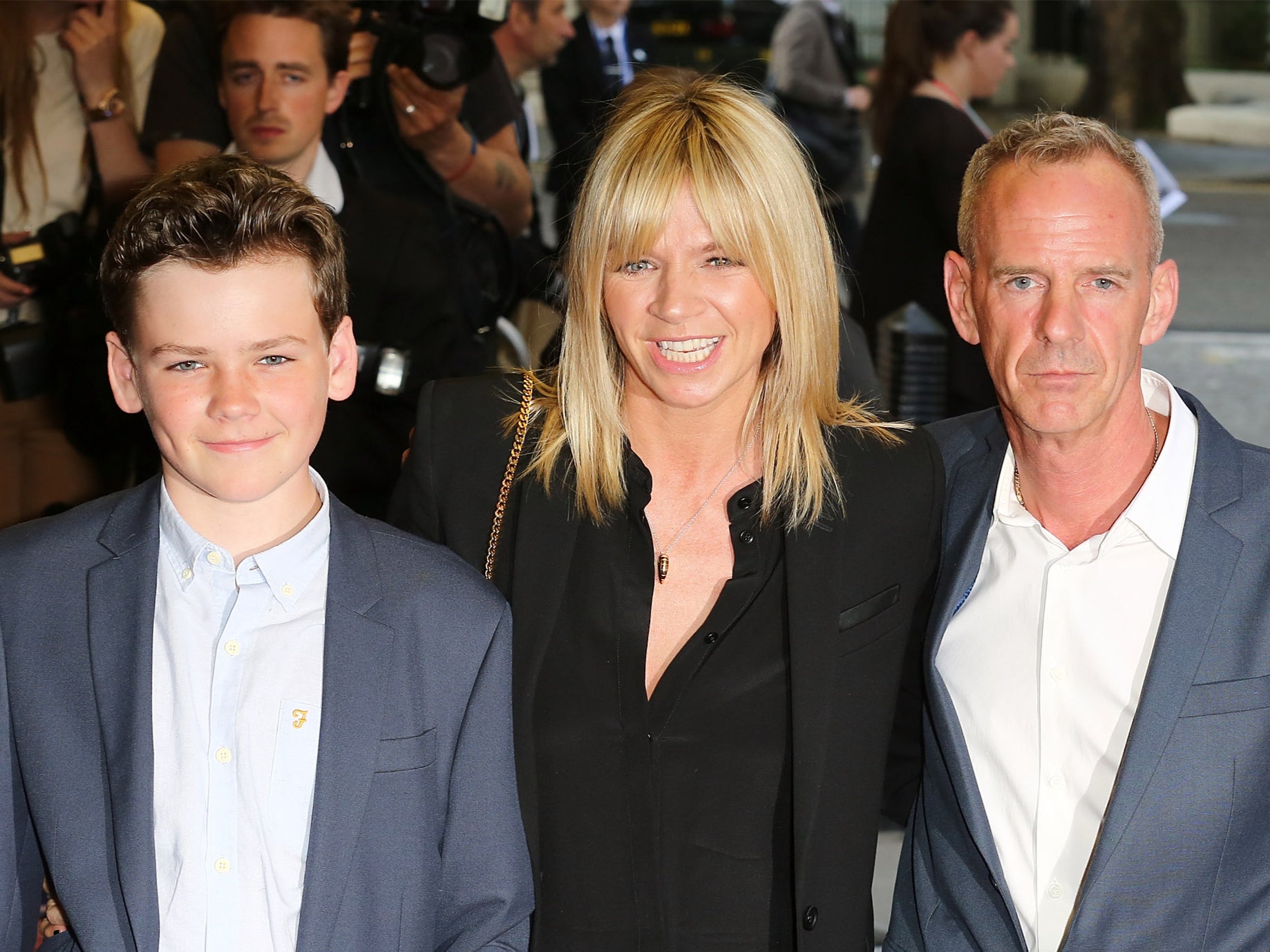 Woody with his parents Zoe Ball and Norman Cook in 2014