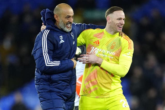 Nuno Espirito Santo celebrates with goalkeeper Matz Sels (Peter Byrne/PA)