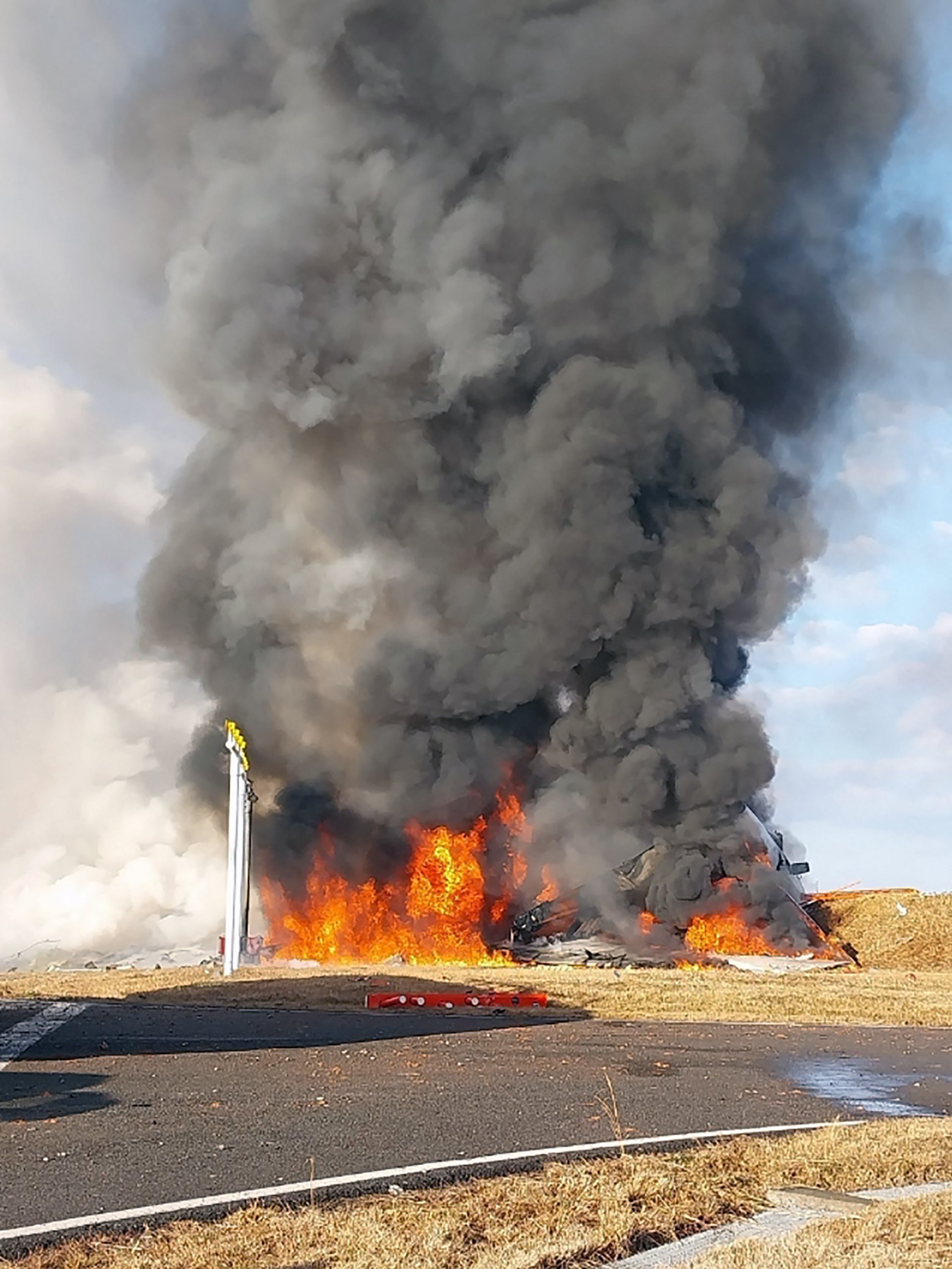 Moments after landing the plane burst into flames