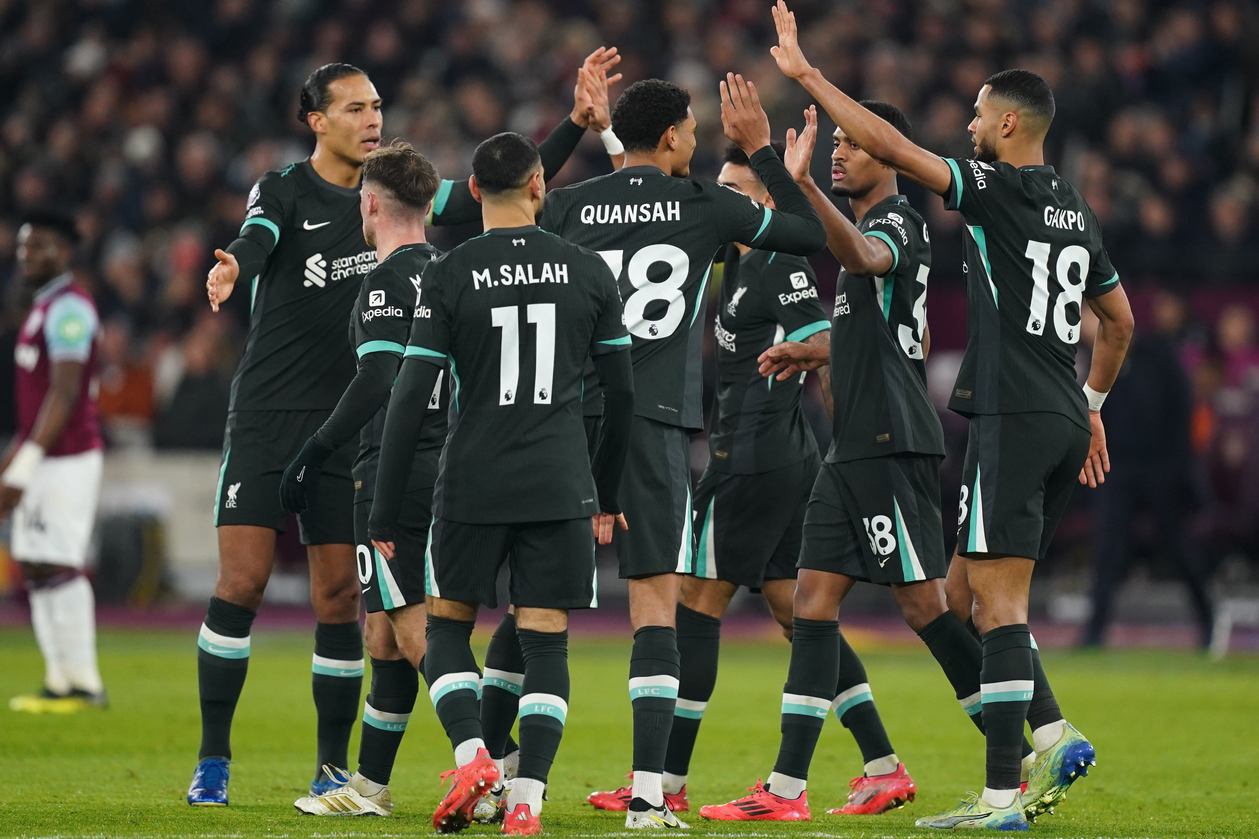 Liverpool hammer West Ham to sit pretty at top of Premier League