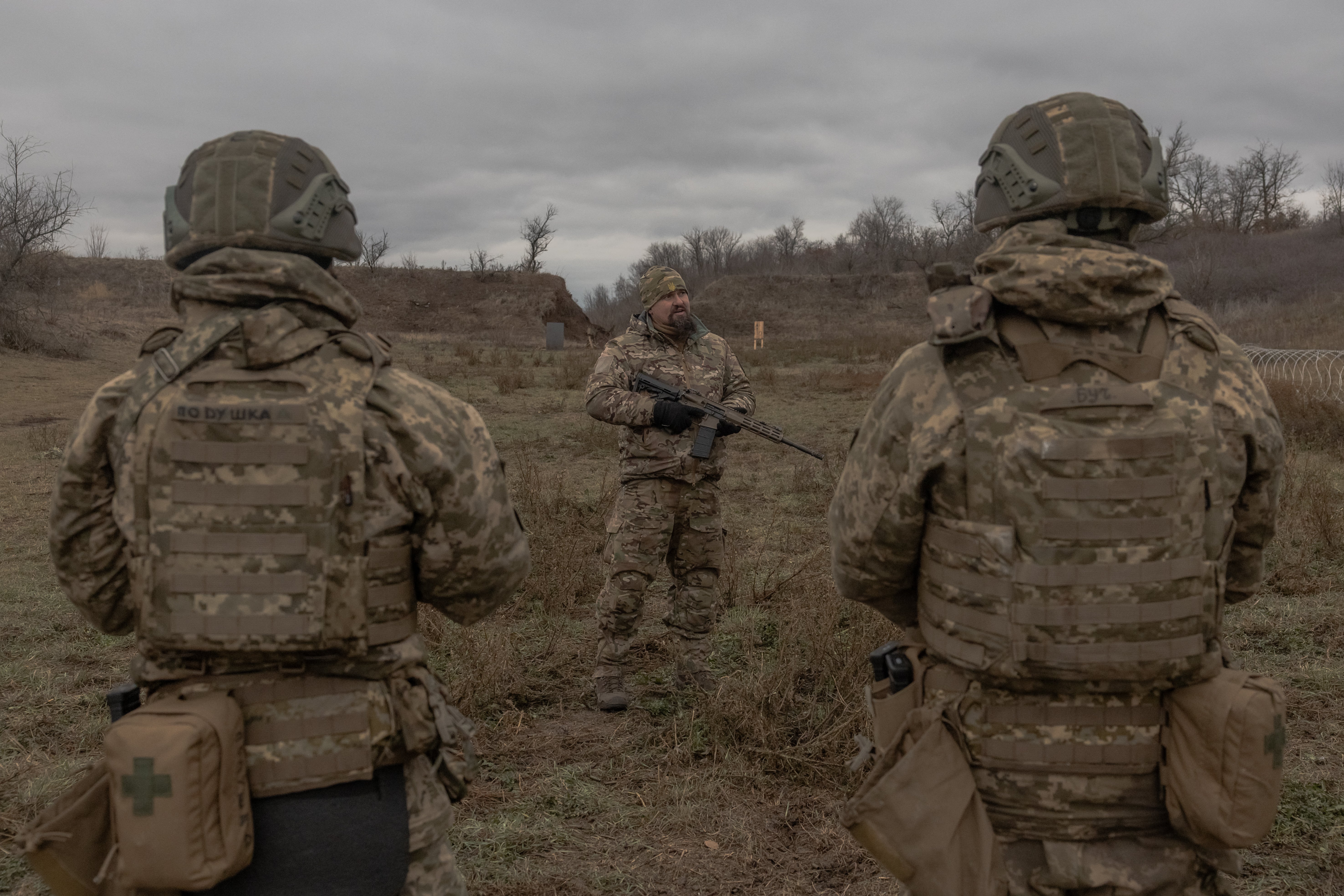 Company commander of the 1st Separate Assault Battalion Da Vinci addresses Ukrainian soldiers during a training exercise in the Dnipropetrovsk region