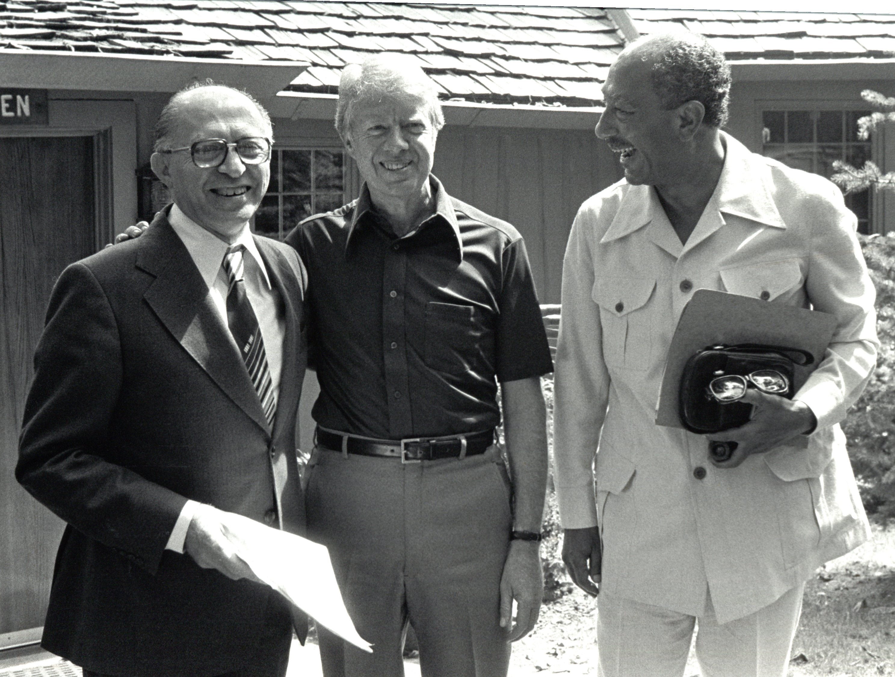 Carter with Egyptian president Anwar al Sadat (right) and Israeli prime minister Menachem Begin during Middle East peace negotiations at Camp David in 1978