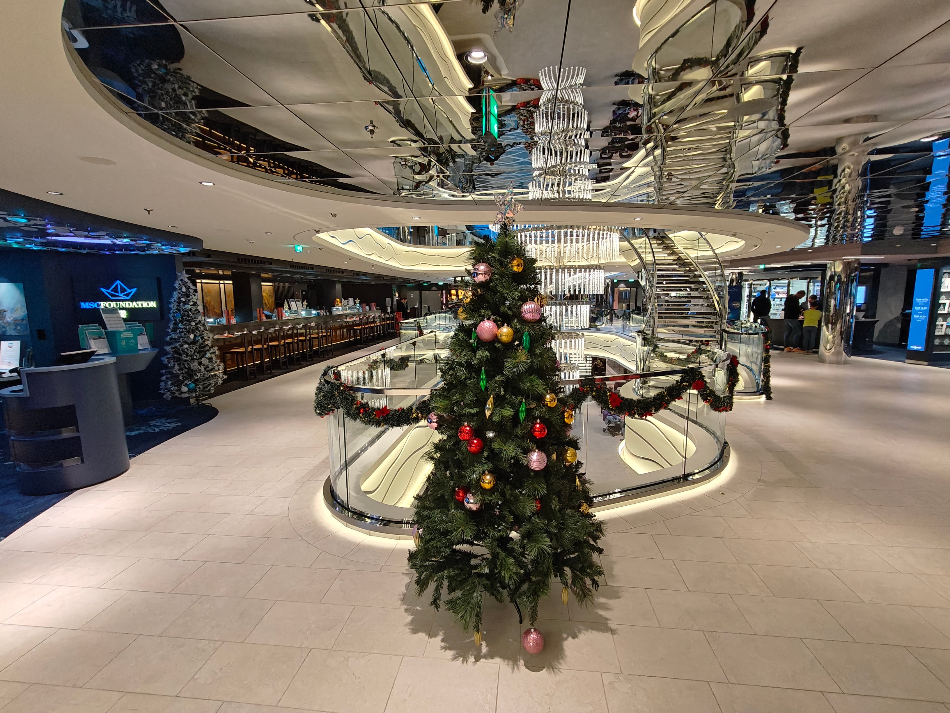 Christmas trees were lined up across MSC World Europa to help passengers step into Christmas