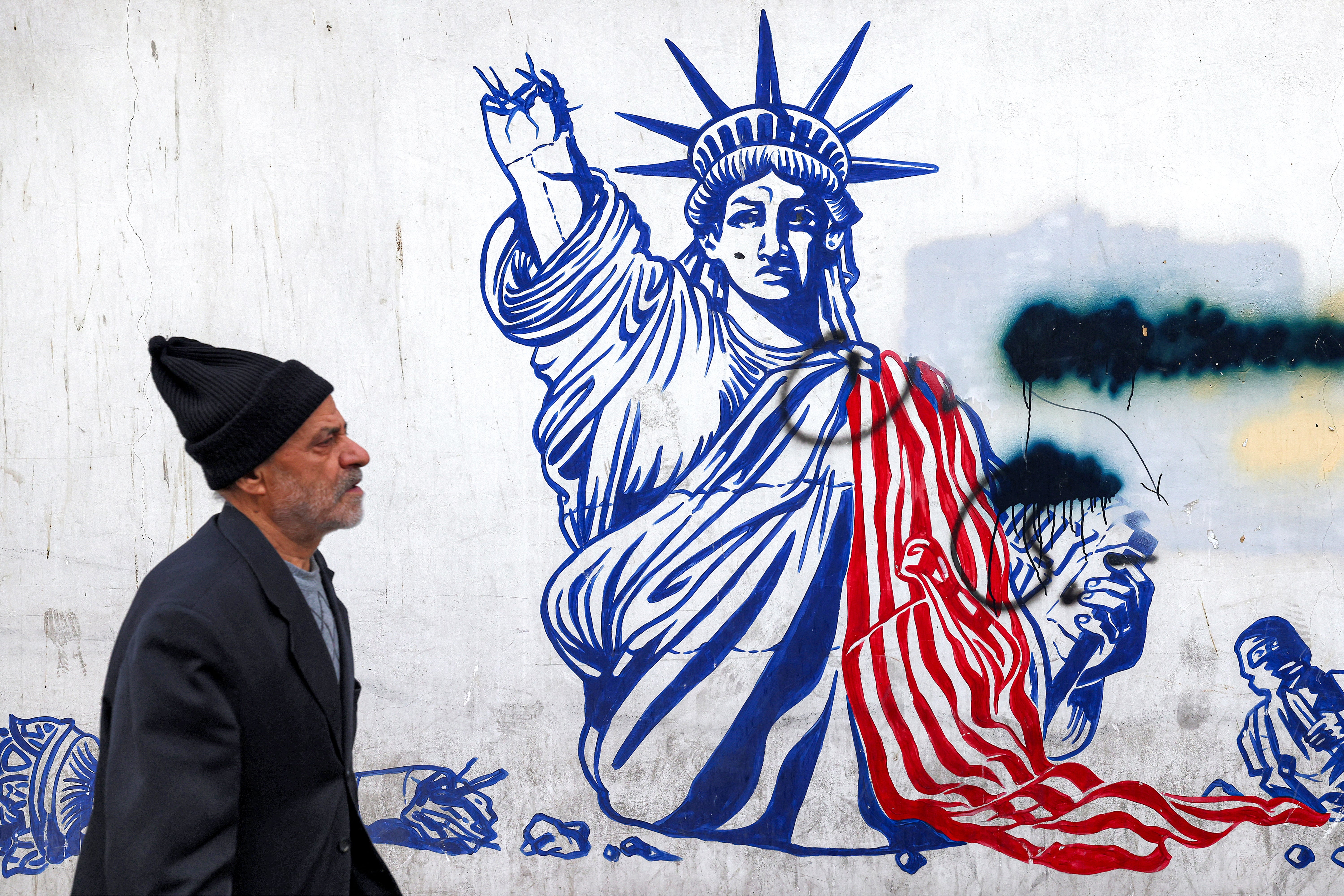 Graffitti on the walls of the former US embassy headquarters in Theran photographed on Monday which was stormed and occupied by Iranian students in November 1979