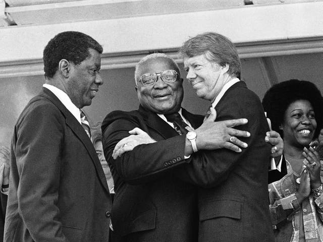 <p>His father Earl was a white supremacist, but Carter’s formative experiences led him to fight for Black civil rights alongside Martin Luther King Jr (whose father is pictured centre) </p>