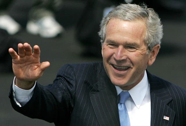 <p> US President George Bush waves at onlookers as he arrives, at Prestwick airport for the G8 Summit at Gleneagles</p>