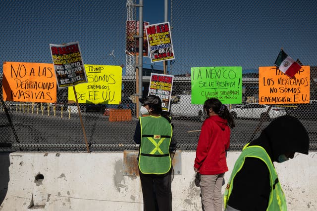 <p>Migrants and advocates demonstrate at the San Ysidro crossing port on the US-Mexico border in Tijuana, Baja California State, Mexico, on December 18, 2024, during International Migrants Day</p>