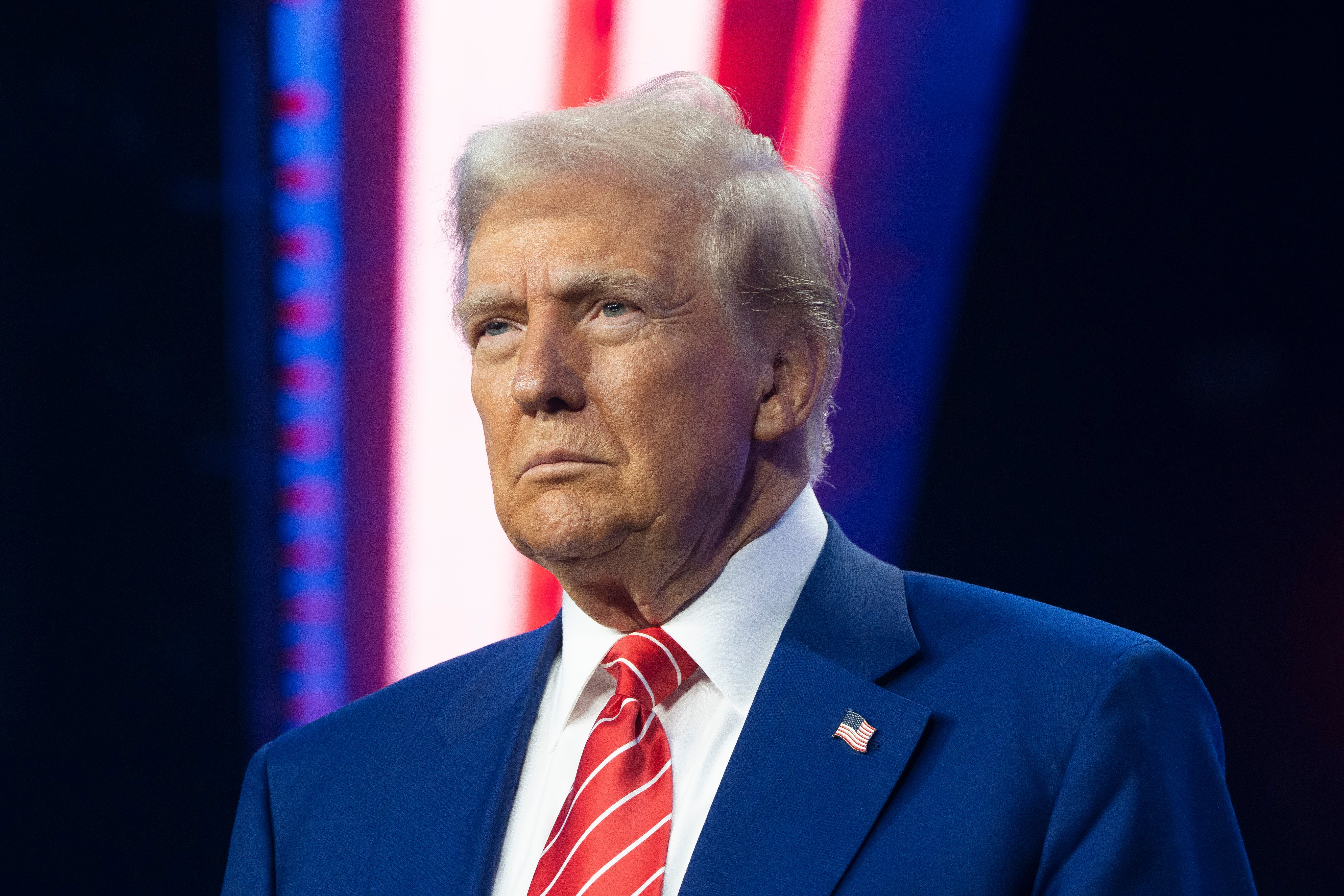 President-elect Donald Trump looks on during Turning Point USA's AmericaFest at the Phoenix Convention Center last week in Phoenix, Arizona. His cabinet picks have been ordered to get any social media posts cleared ahead of time by the incoming White House counsel