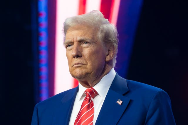 <p>President-elect Donald Trump looks on during Turning Point USA's AmericaFest at the Phoenix Convention Center last week in Phoenix</p>