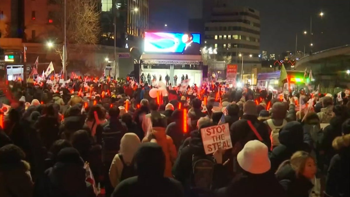 South Korea protesters hold ‘Stop the Steal’ banners after arrest warrant issued for impeached president