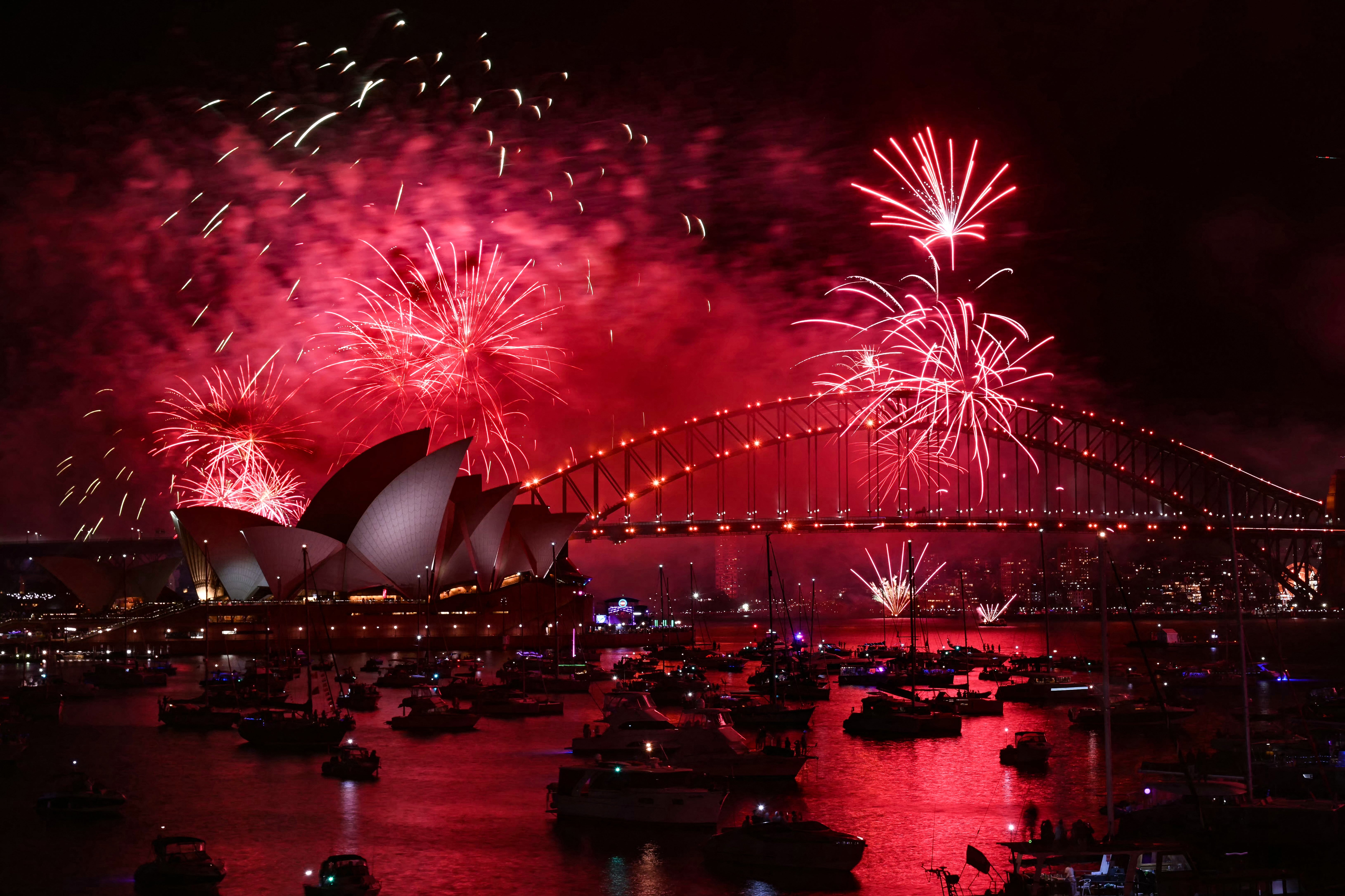 <p>Bright fireworks lit up the skies over Sydney’s world-famous opera house </p>