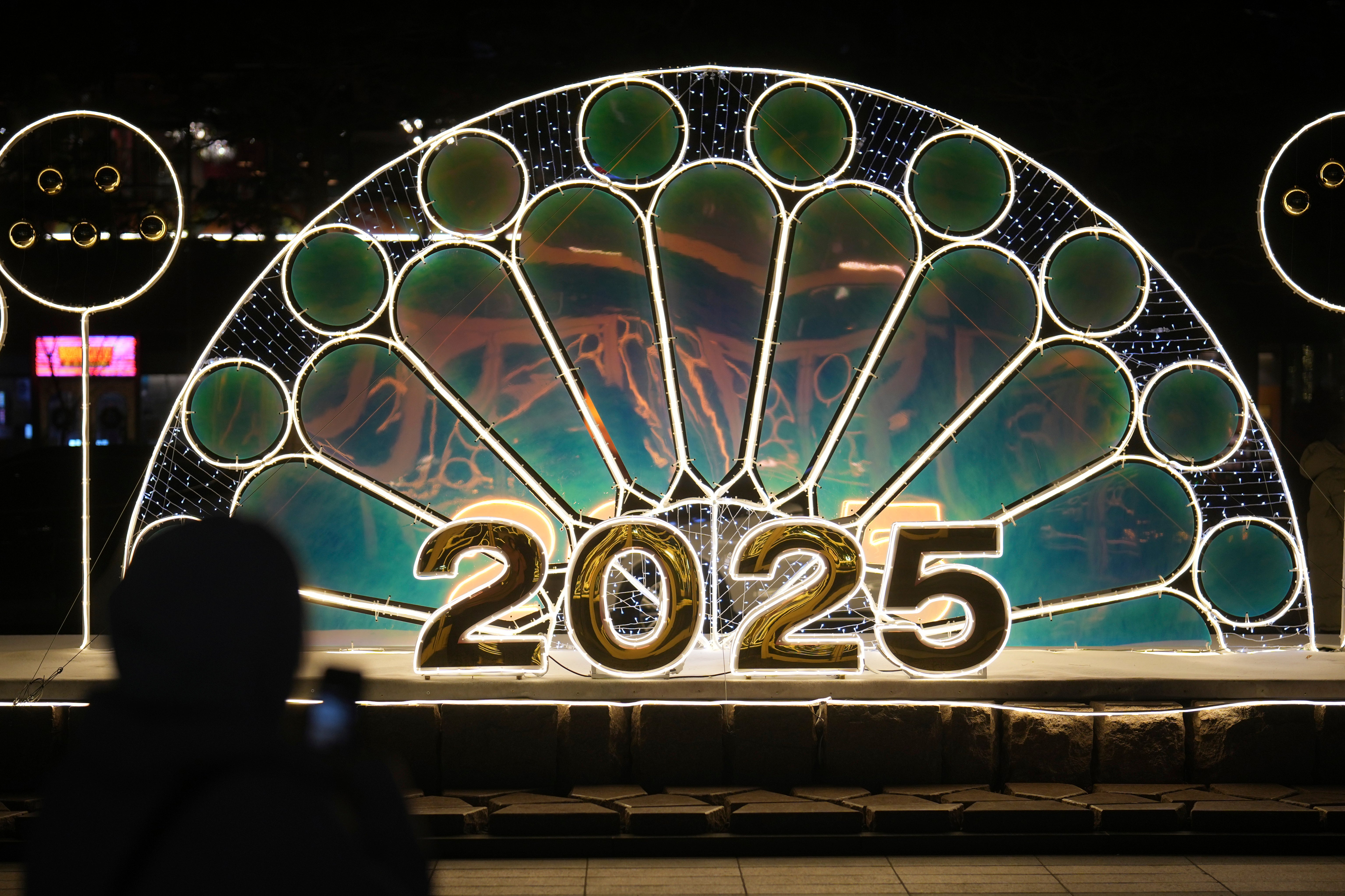 A light display in Seoul welcomes in 2025, after a difficult end to the year in South Korea