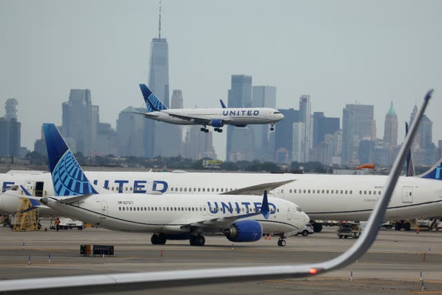 <p>United Airlines planes sitting at Newark Liberty International Airport</p>