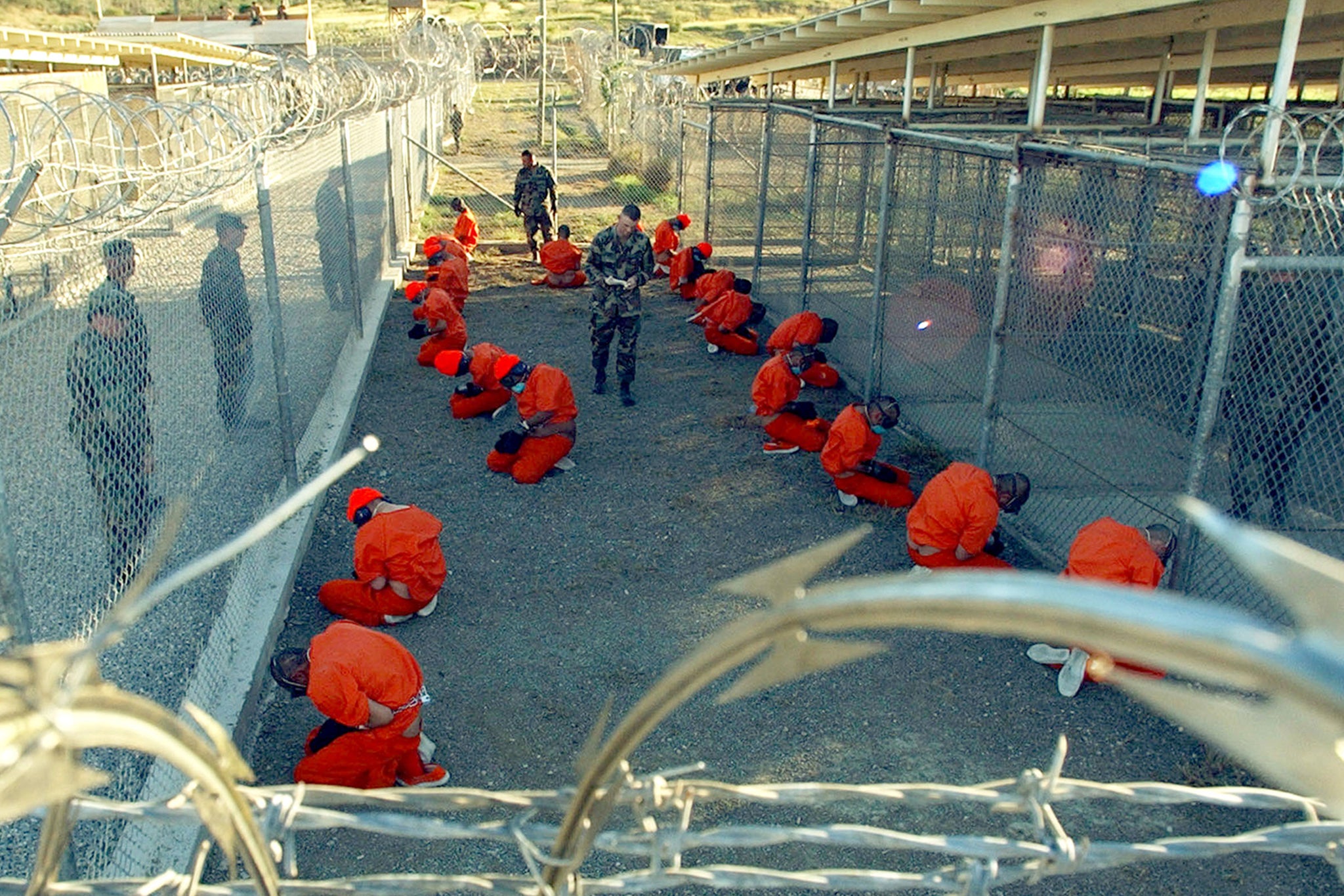 Al-Yazidi was pictured with other prisoners being processed at Guantanamo Bay on January 11, 2002