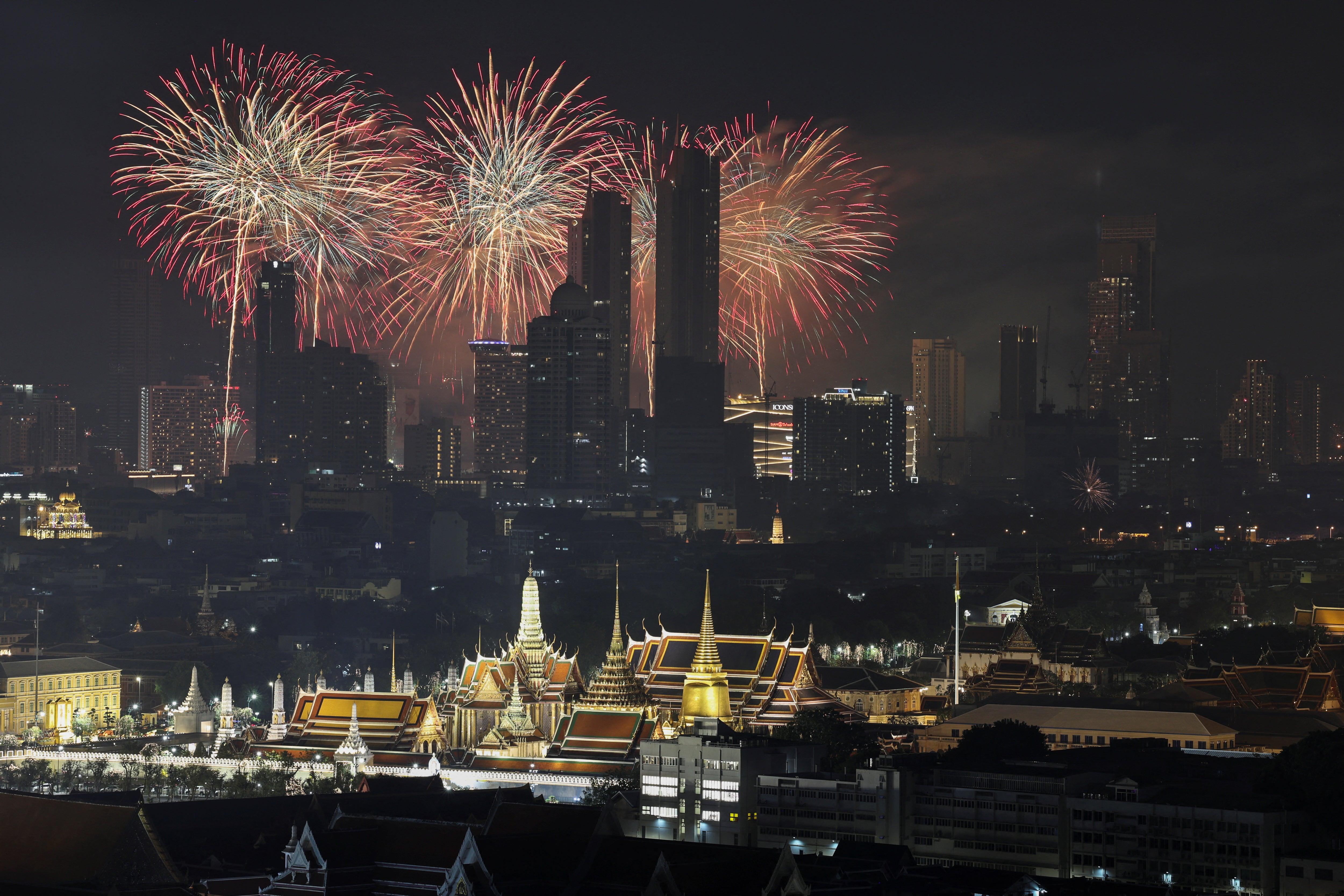 Fireworks explode over the Grand Palace in Bangkok