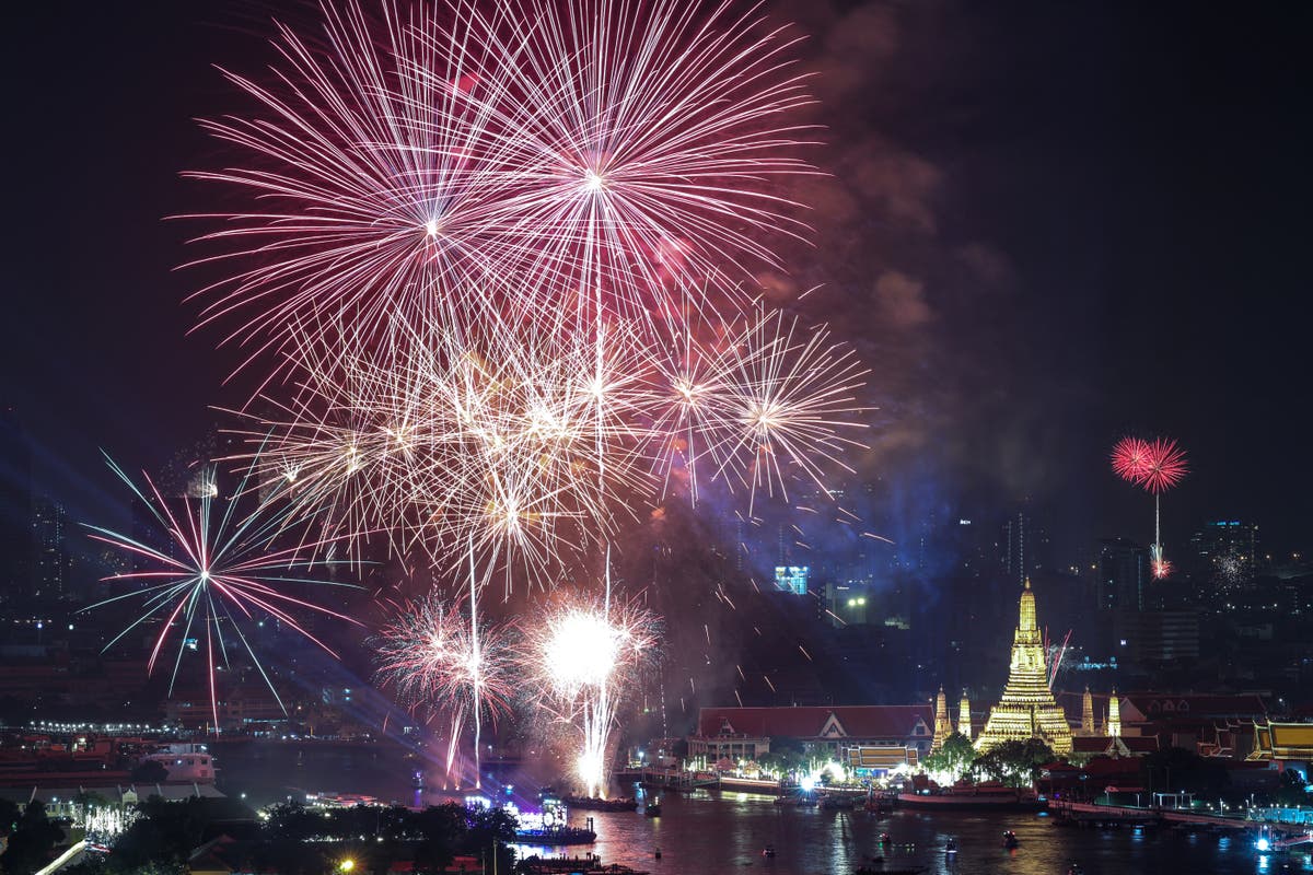 New Year’s celebrated across world but UK events cancelled due to bad weather: live