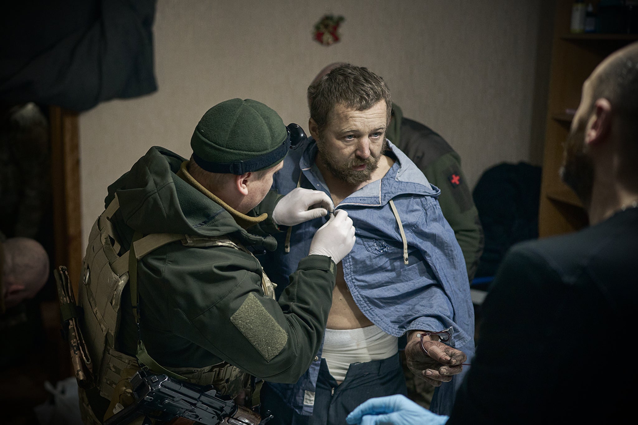 Medics provide care at a first aid post in Kupyansk