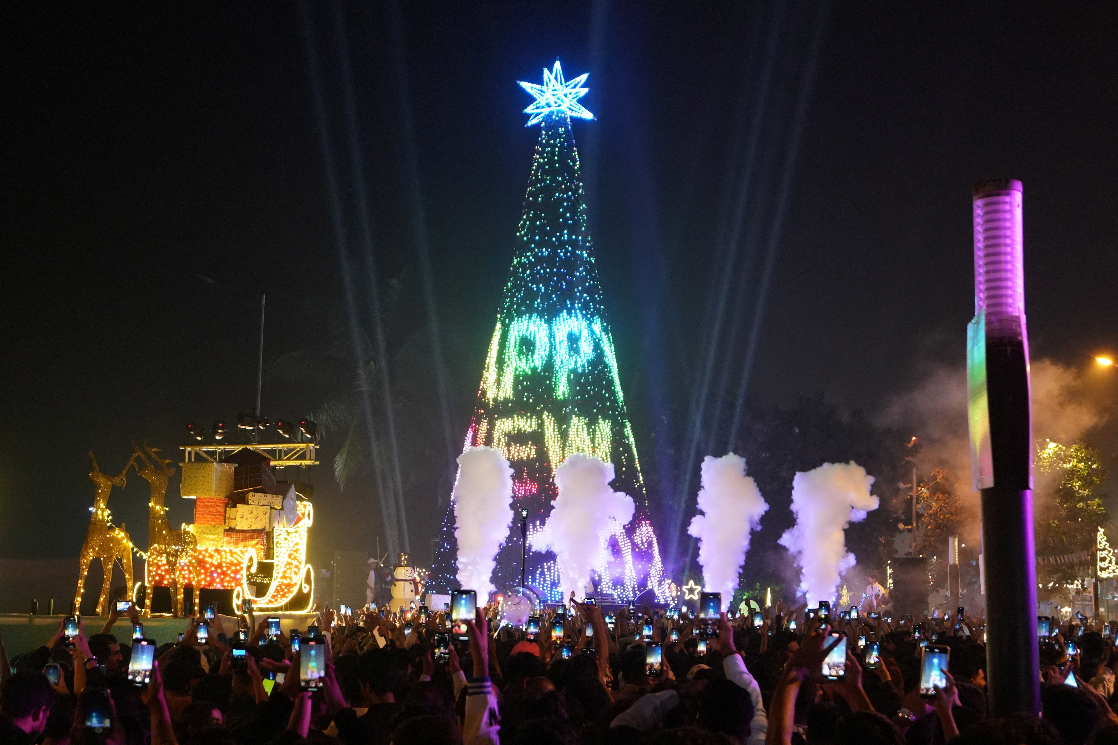 People attend New Year’s Eve celebrations in Mumbai, India