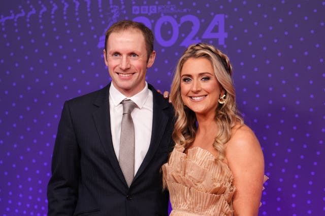 Laura Kenny, right, with husband Jason at the BBC’s Sports Personality of the Year awards (Martin Rickett/PA)