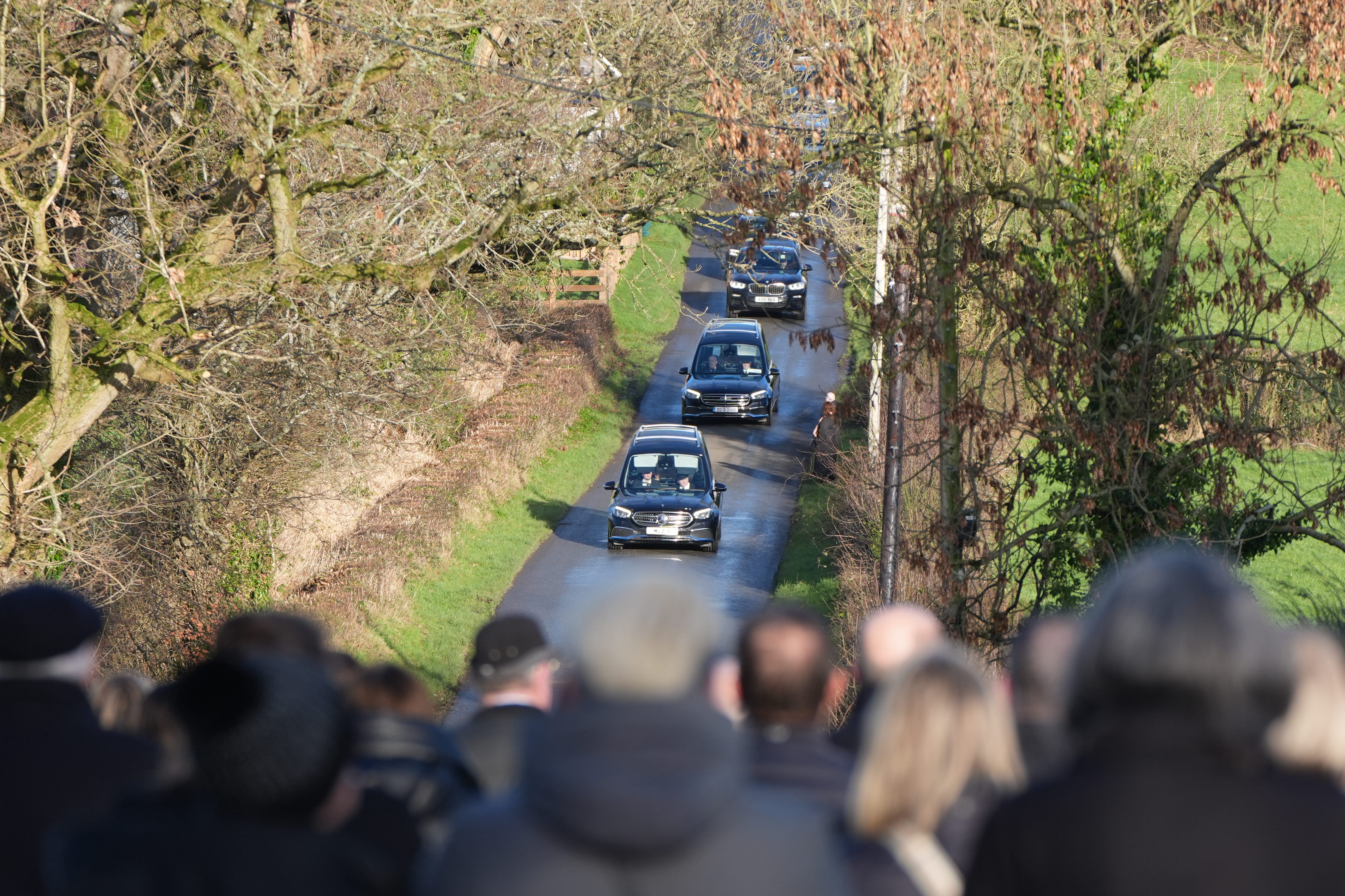 The Killylea community is still in shock over the deaths of father and son Peter and Loughlin Devlin in a crash just two days after Christmas, their funeral has heard (Niall Carson/PA)
