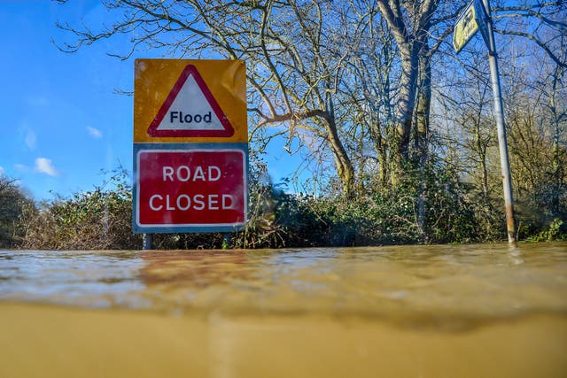 Mountain rescue teams have been deployed to help Greater Manchester Fire and Rescue Service deal with damaged properties and stranded vehicles (Ben Birchall/PA)
