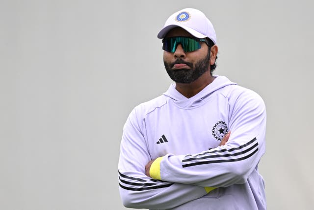 <p>India's Rohit Sharma watches teammates during a practice session ahead of the fifth cricket Test match between Australia and India at the Sydney Cricket Ground in Sydney </p>