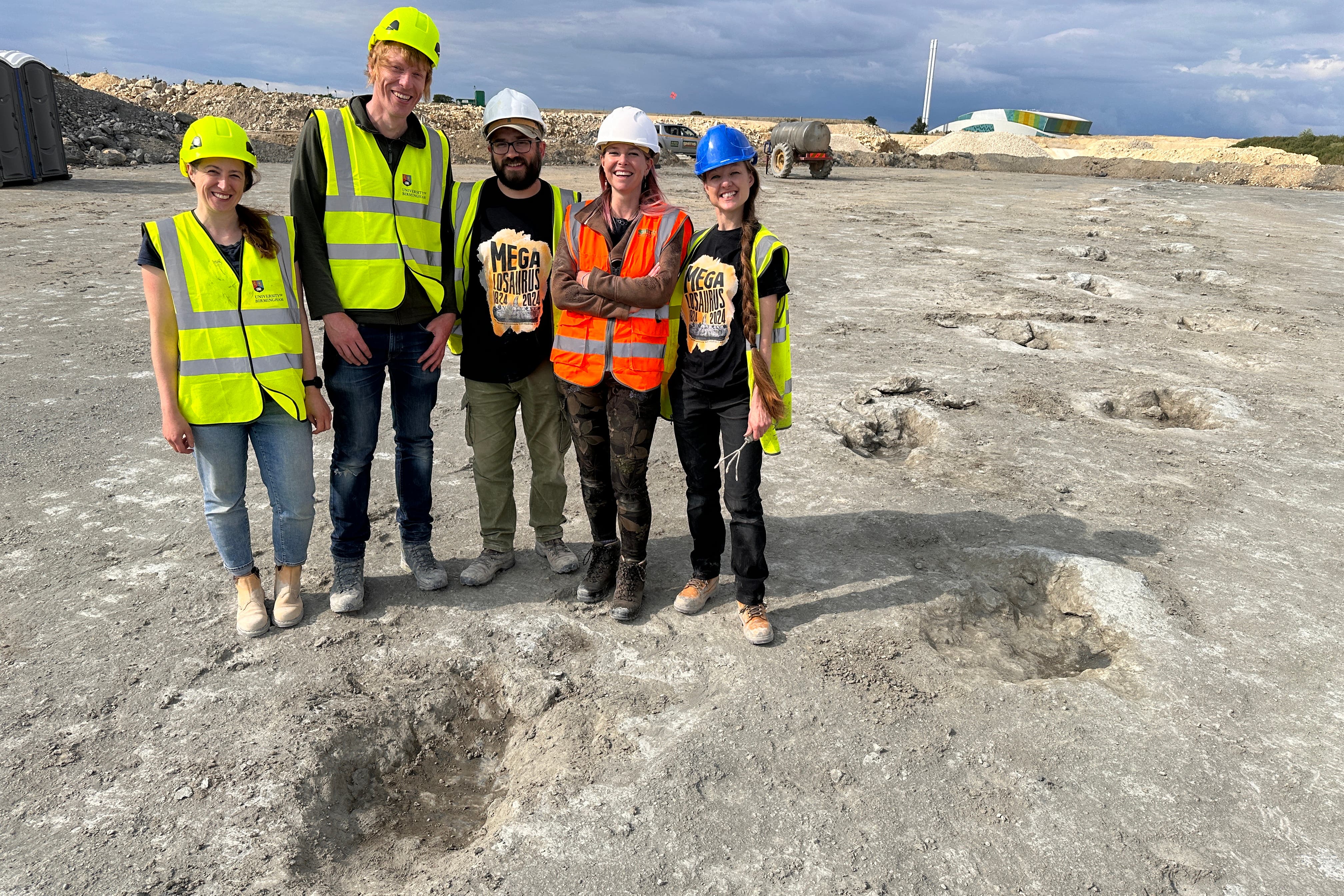 Research teams from the Universities of Oxford and Birmingham uncovered nearly 200 dinosaur footprints during a week-long dig. From left to right: Kirsty Edgar, Richard Butler, Duncan Murdock, Alice Roberts, and Emma Nicholls (University of Birmingham/PA)