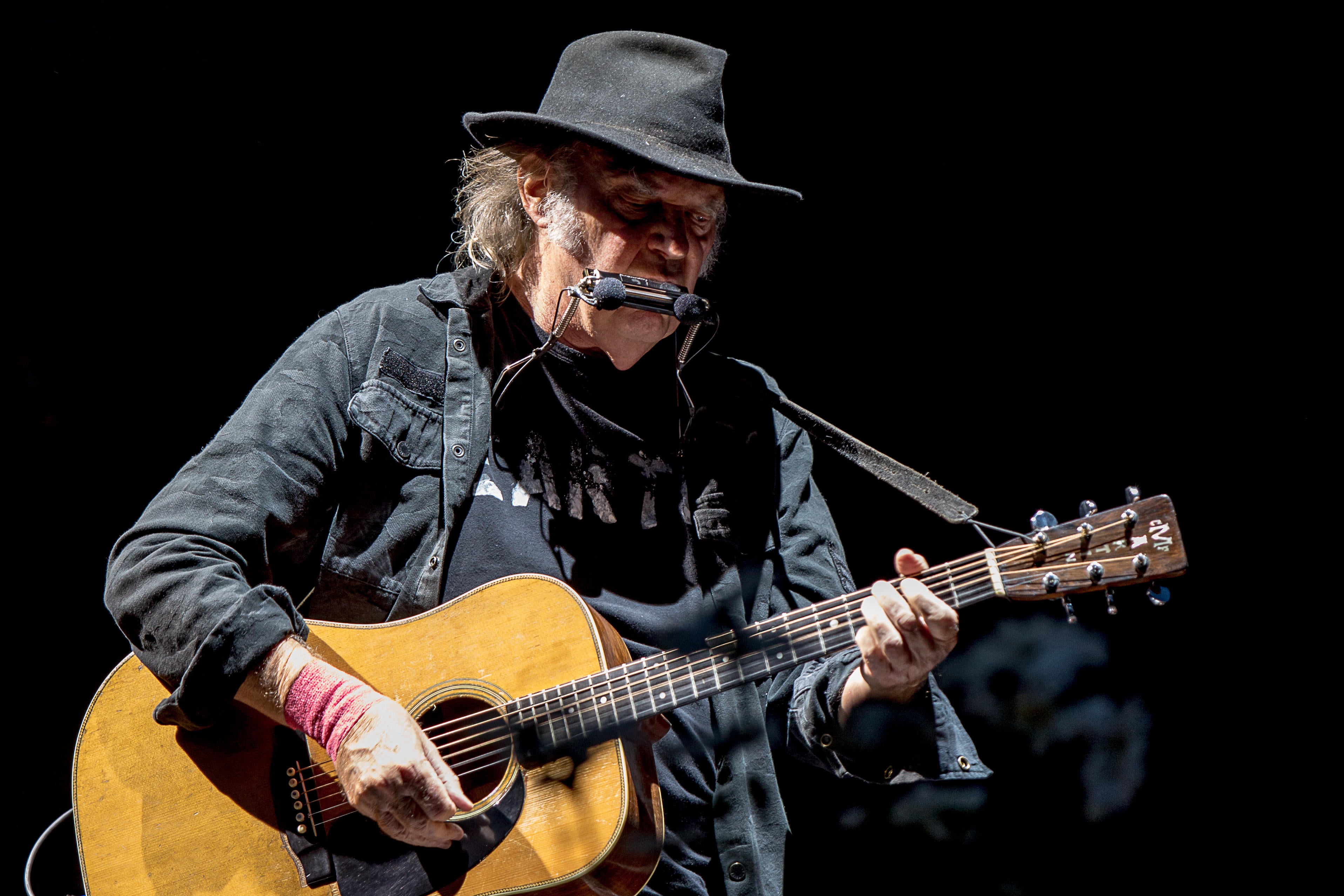 R1KGFJ Neil Young performs at the Wayhome Music & Arts Festival in Oro-Medonte, CANADA