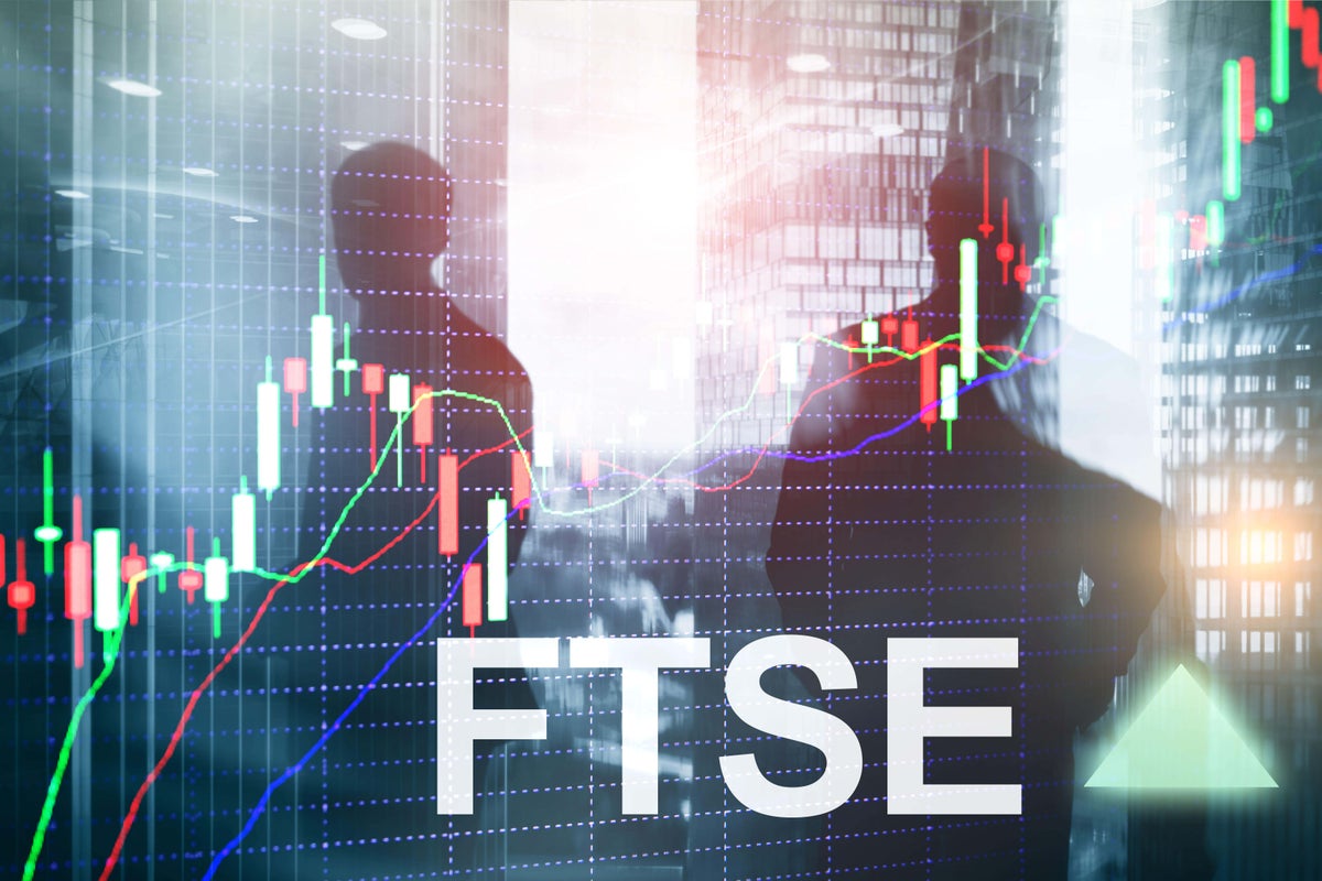 FTSE 100 closes above milestone 10,000 mark for first time