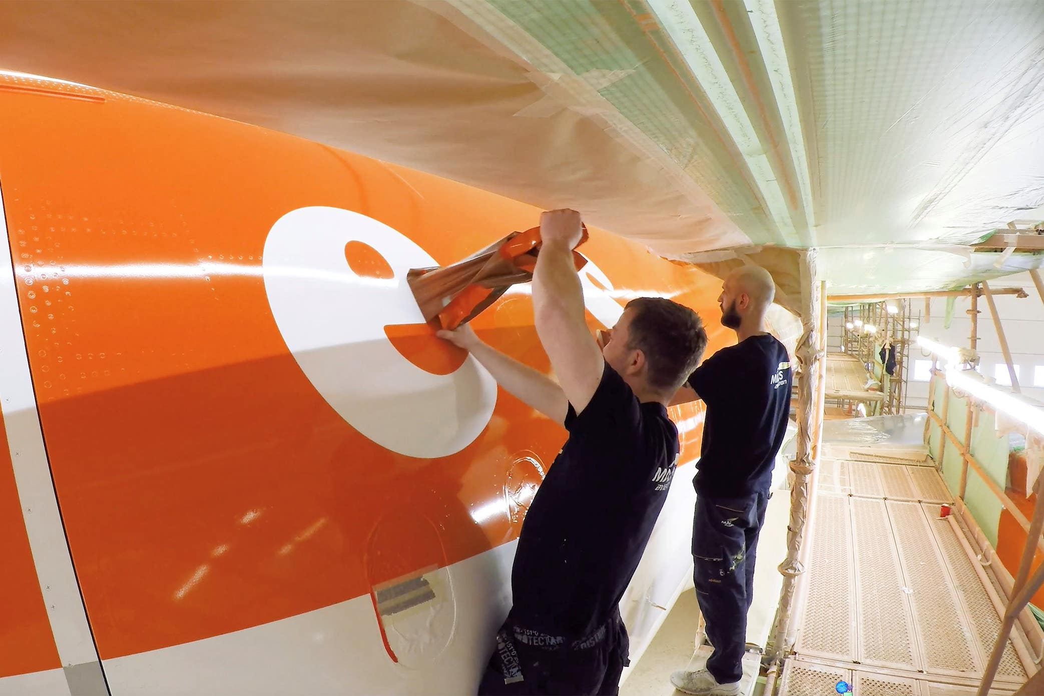 EasyJet said it has become the world’s first airline to use a lower-weight paint method to reduce its planes’ fuel burn (EasyJet/PA)