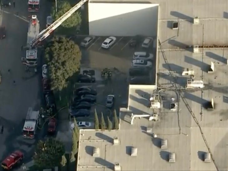 One dead and 15 injured as plane crashes into warehouse outside Los Angeles