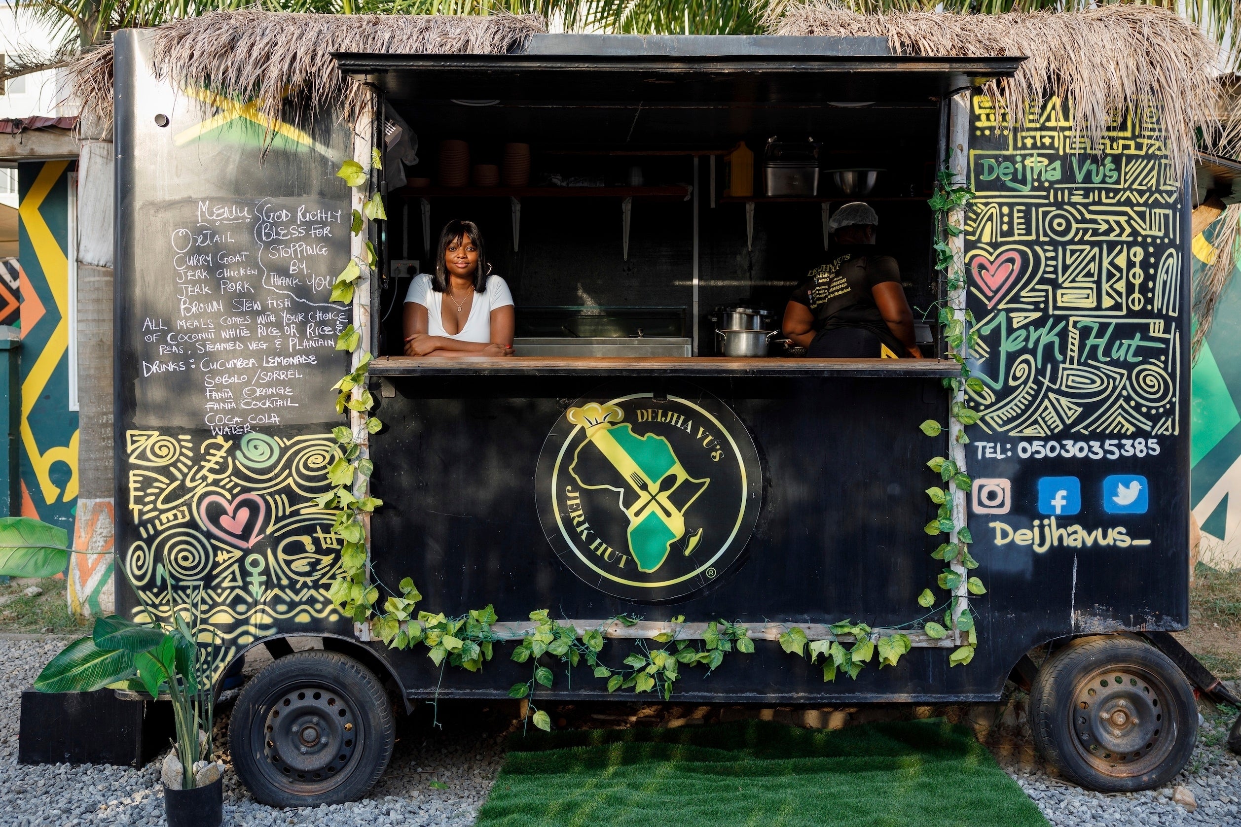 Deijha Gordon, 33, poses for a photograph in her food truck in Accra, Ghana