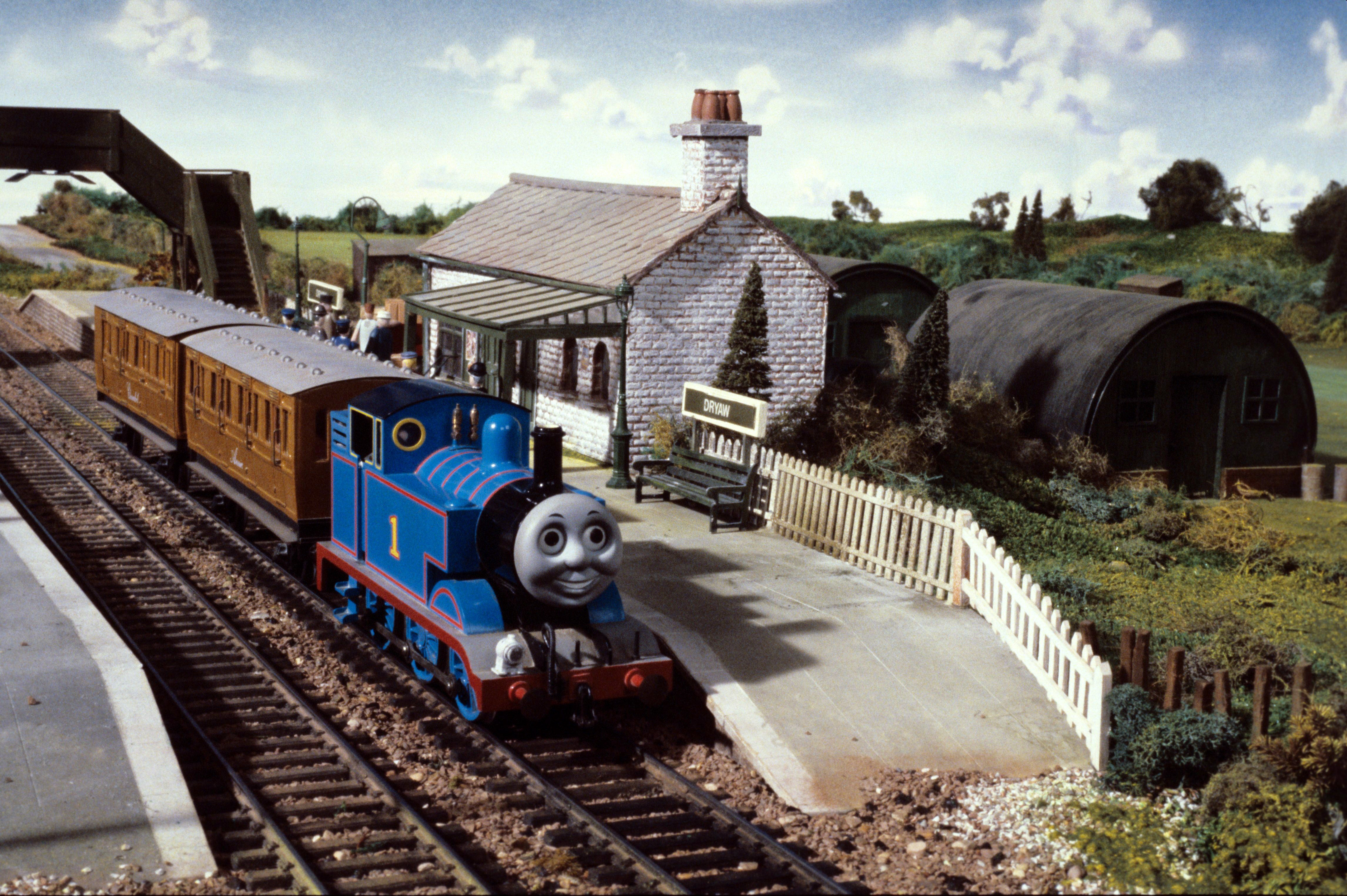 The famous blue engine stops at a station in ‘Thomas the Tank Engine & Friends’