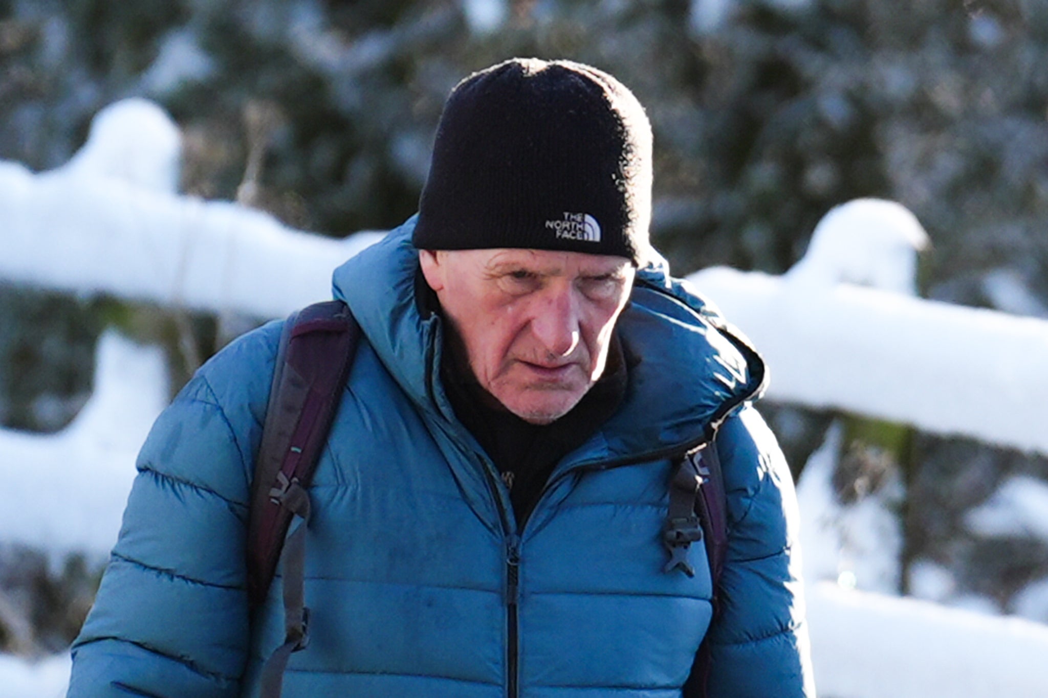 Man walks through snow in Balerno, Edinburgh