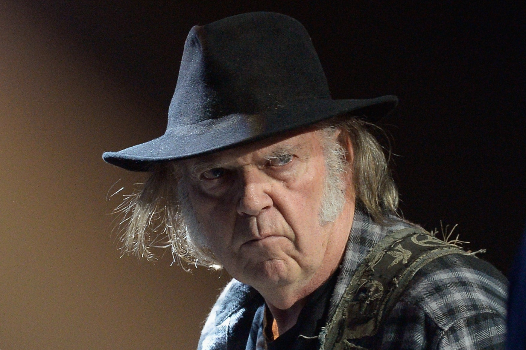 Neil Young on stage at the fourth annual Light Up the Blues event in Hollywood, California, 2016