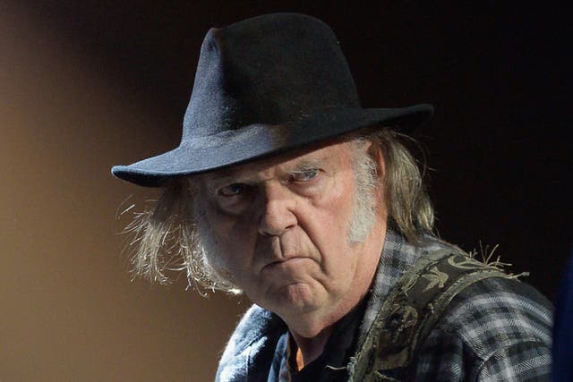 <p>Neil Young on stage at the fourth annual Light Up the Blues event in Hollywood, California, in 2016</p>