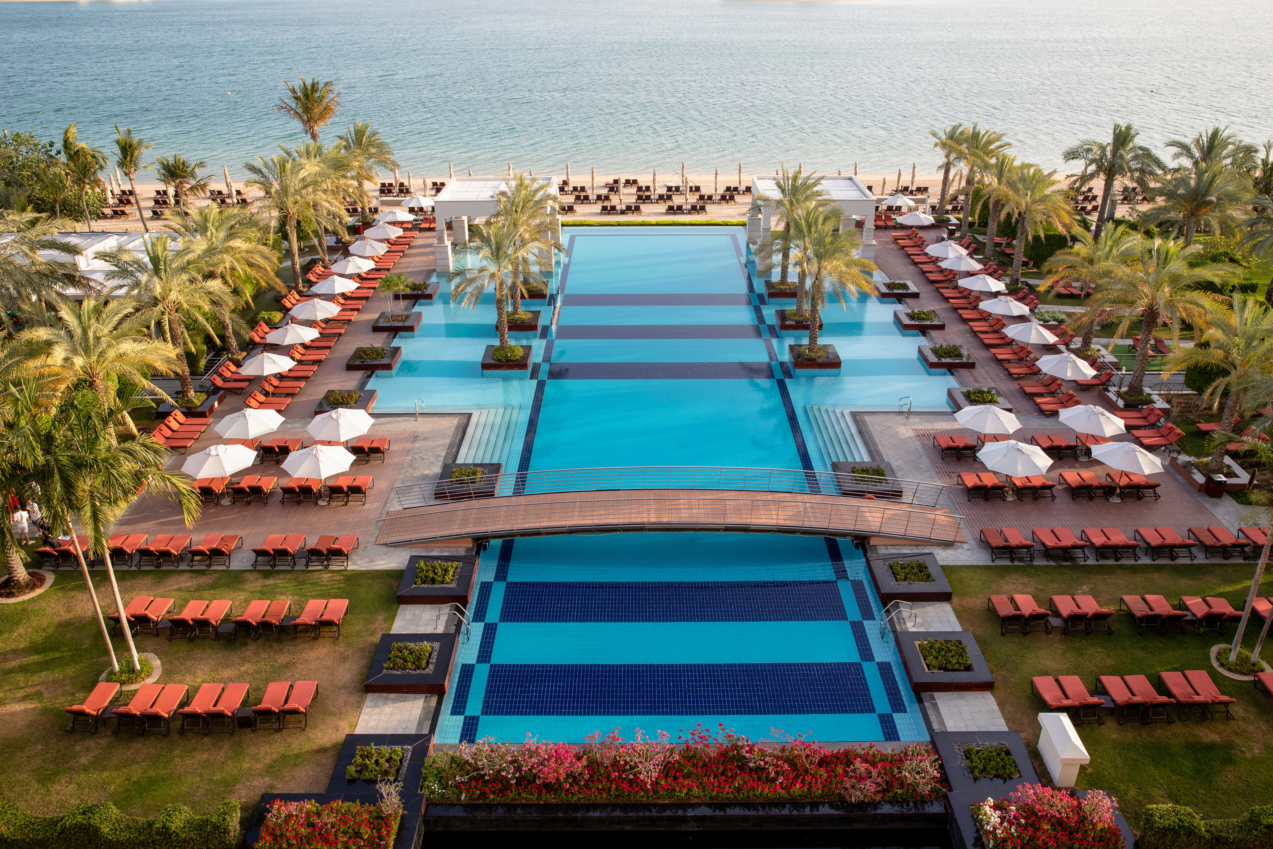 Large swimming pools and a private beach provide the ultimate relaxing stop at the Jumeirah Zabeel Saray