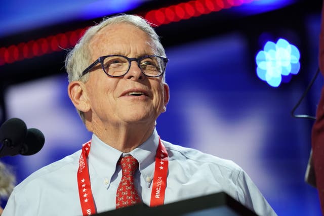 <p>Ohio governor Mike DeWine is seen onstage at the Fiserv Forum during preparations for the Republican National Convention last year in Milwaukee, Wisconsin</p>