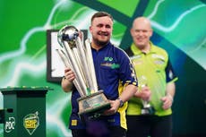 Luke Littler fulfils destiny to become youngest darts world champion on emotional night at Alexandra Palace