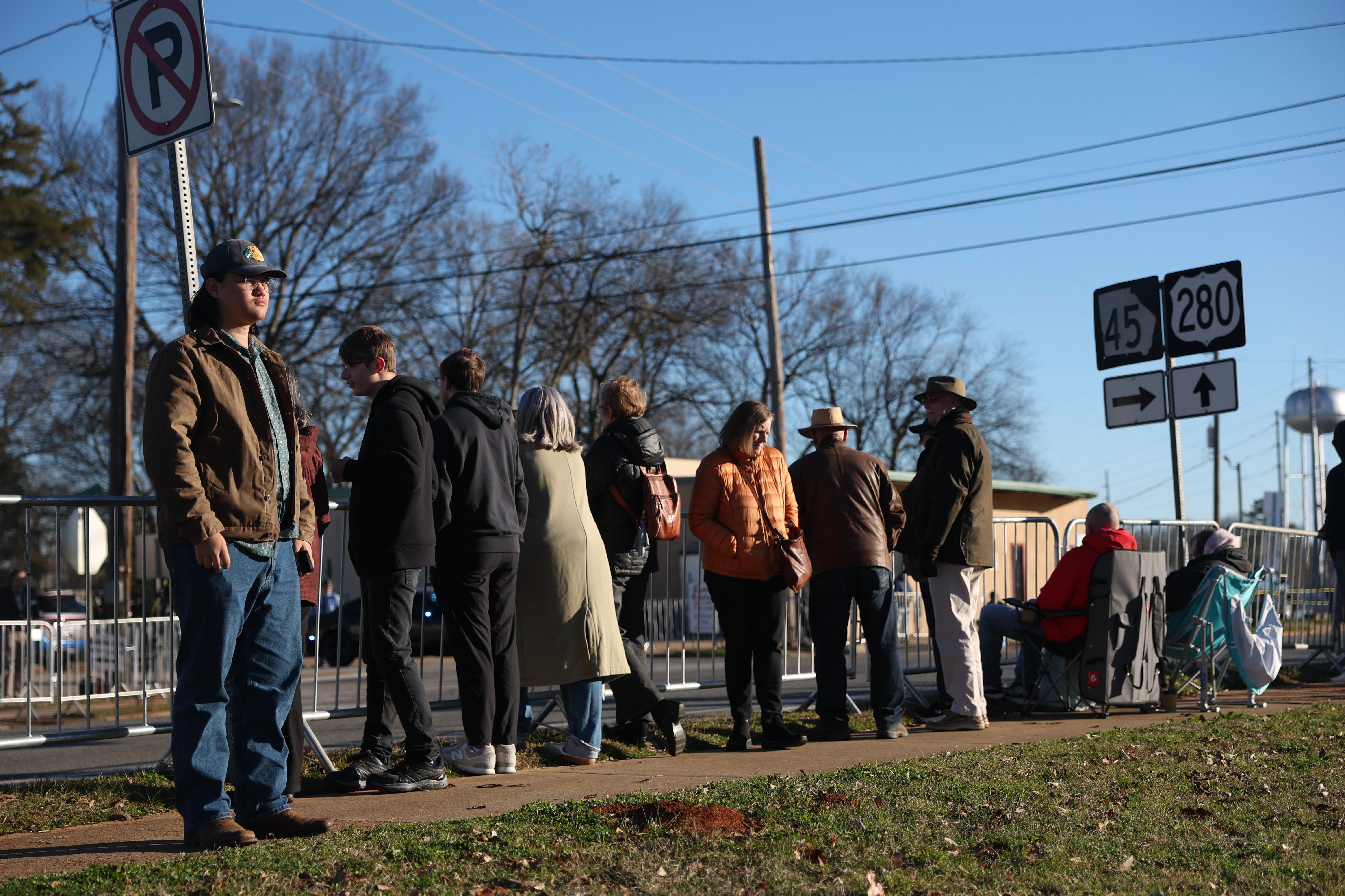 Mourners gather in Plains. Carter’s hearse will pass through between 10 a.m. and 11 a.m. this morning