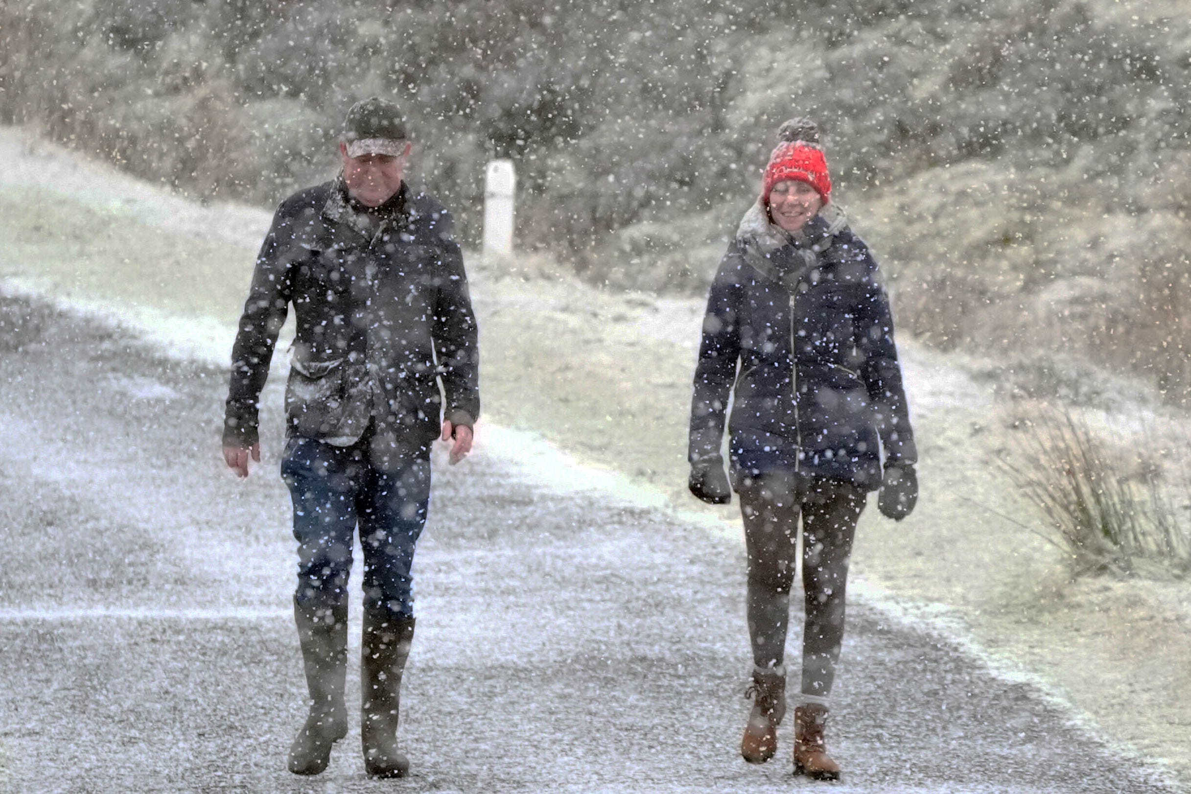 People out walking at the Wicklow Gap mountain pass in Co Wicklow, Ireland