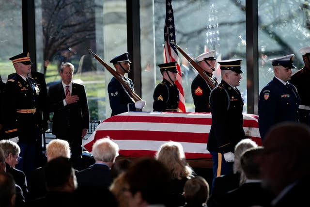 <p>A military body bear teams places the flag-draped casket of former US President Jimmy Carter onto the catafalque at the Jimmy Carter Presidential Library and Museum in Atlanta, Georgia, USA, 04 January 2025</p>